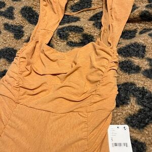 FP movement. Free people. Workout onesie. Color: neutral. Size small. NWT!